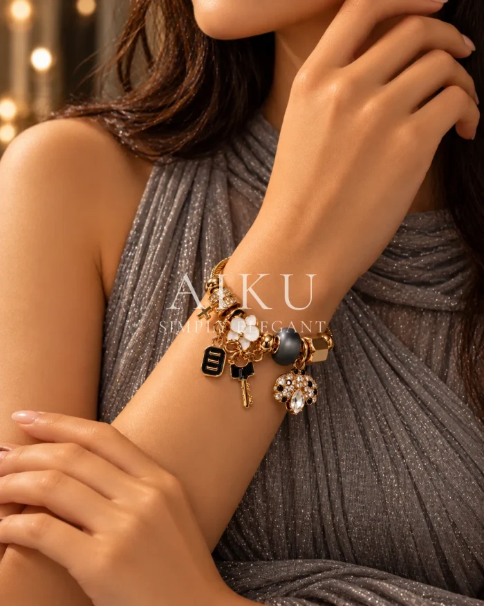 Golden Secrets Charm Bracelet worn by a model
