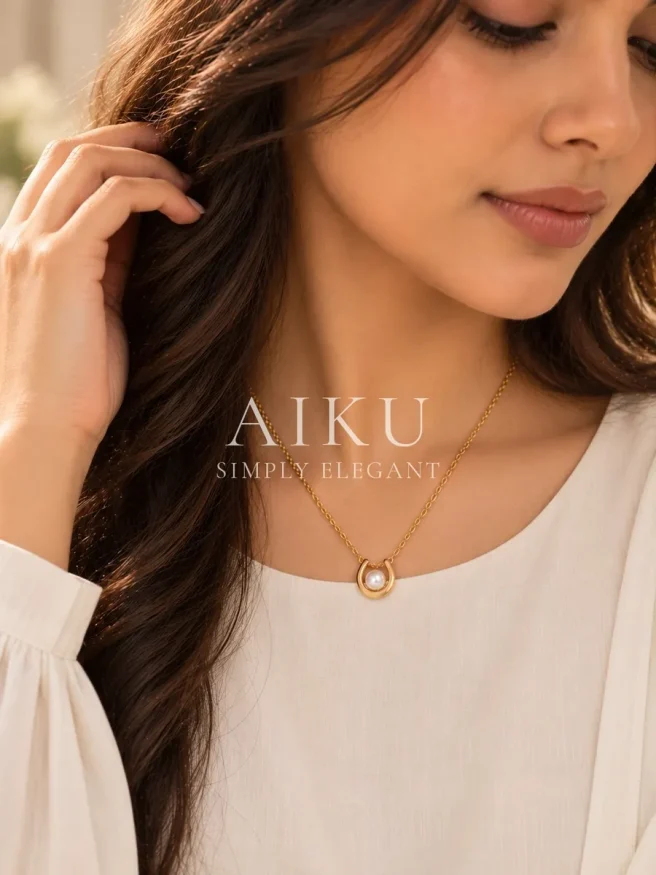 Horseshoe Pearl Necklace worn by a model