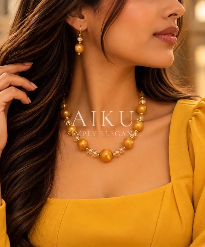 Lustrous Gold Bead & Crystal Necklace worn by a model