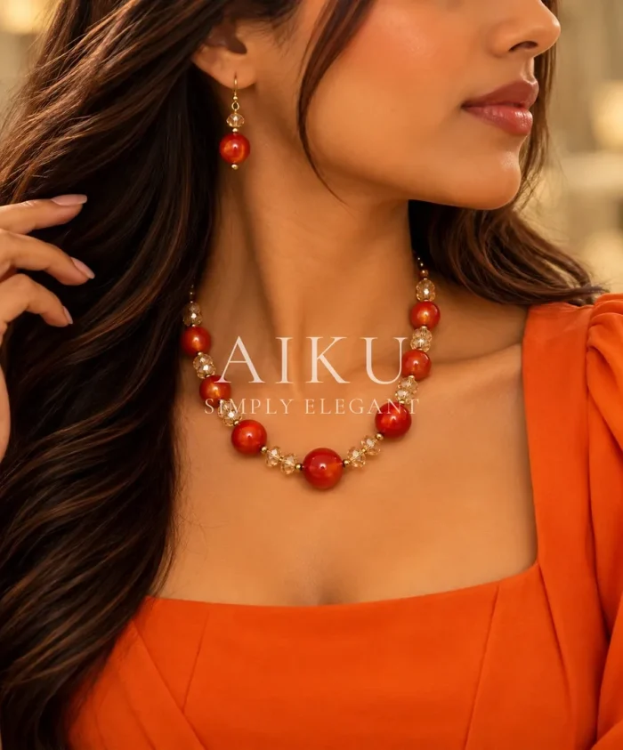 Red Marble Bead & Crystal Necklace worn by a model